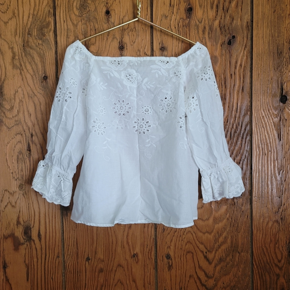 White cotton eyelet peasant top. NWT